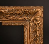 A 19th Century carved frame, rebate size 14