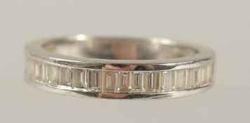 AN 18CT WHITE GOLD AND DIAMOND BAGUETTE RING.
