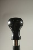 A CHROME HANDLE WALKING STICK 