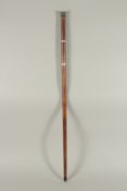 A RARE 19TH CENTURY WALKING STICK with metal top and two screw off sections revealing a long glass