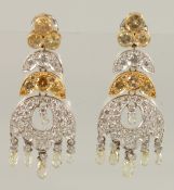 BERGANZA. A GOOD PAIR OF YELLOW AND WHITE GOLD DIAMOND DROP EARRINGS. 1597.