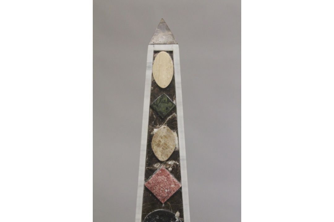 A GOOD PAIR OF COLOURED MARBLE OBELISKS ON STANDS. 6ft high. - Image 2 of 6