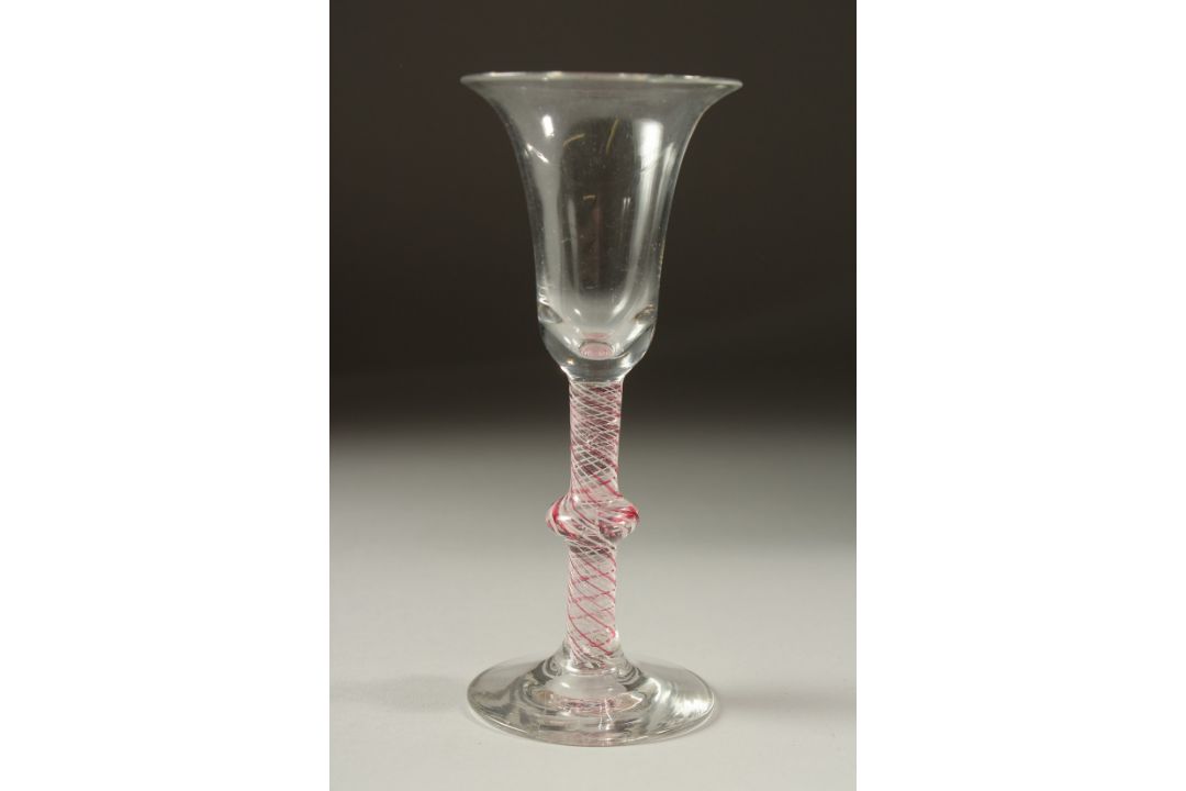 A DUTCH WINE GLASS with inverted bell bowl and coloured twist stem and knop. 6.5ins high. - Image 1 of 3