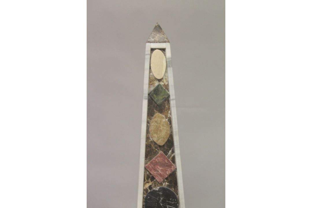 A GOOD PAIR OF COLOURED MARBLE OBELISKS ON STANDS. 6ft high. - Image 4 of 6