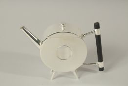 A CHRISTOPHER DRESSER DESIGN PLATE POLO WITH THE HOLE TEAPOT.