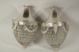 A PAIR OF SILVER PLATE ACORN LIGHT FITTINGS. 40cms long.