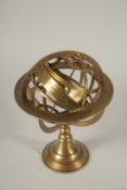 A BRASS ORRERY. 26cms high.