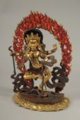 A GOOD GILT BRONZE GOD with a halo. 30cms high.