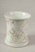 A GOOD CHINESE BLANC DE CHINE CIRCULAR BRUSH POT with birds and foliage in relief.
