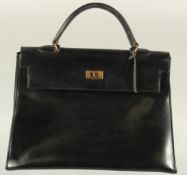 A VERY GOOD VINTAGE HERMES BLACK LEATHER BAG, 1963. 36cms long x 26cms deep x 13cms wide, with a