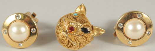 A PAIR OF CHRISTIAN DIOR GILT METAL AND PEARL EAR CLIPS and a CAT BROOCH.