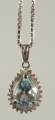 A PLATINUM PEAR SHAPED PENDANT SET WITH PEAR SHAPED AQUAMARINE AND HALO OF RBC DIAMONDS ON A