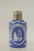 A WEDGWOOD BLUE AND WHITE JASPER WARE SCENT BOTTLE.