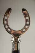 A CHROME HANDLE WALKING STICK 