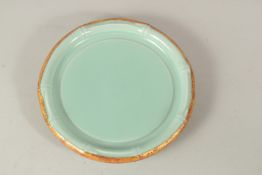 A CHINESE LONGQUAN DISH. 22cms diameter.