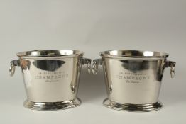 A LARGE PAIR OF OVAL CHAMPAGNE COOLERS with ring handles. 24cms high.