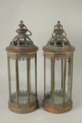 A PAIR OF COPPER LANTERNS. 55cms high.