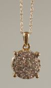 A 9CT YELLOW GOLD MULTI CLUSTER DIAMOND PENDANT ON 9CT YELLOW GOLD CHAIN, boxed. RBC and R/C