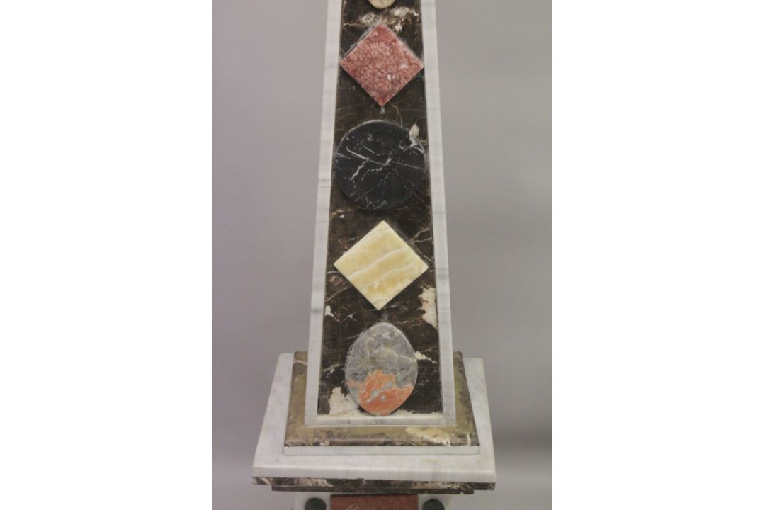 A GOOD PAIR OF COLOURED MARBLE OBELISKS ON STANDS. 6ft high. - Image 3 of 6