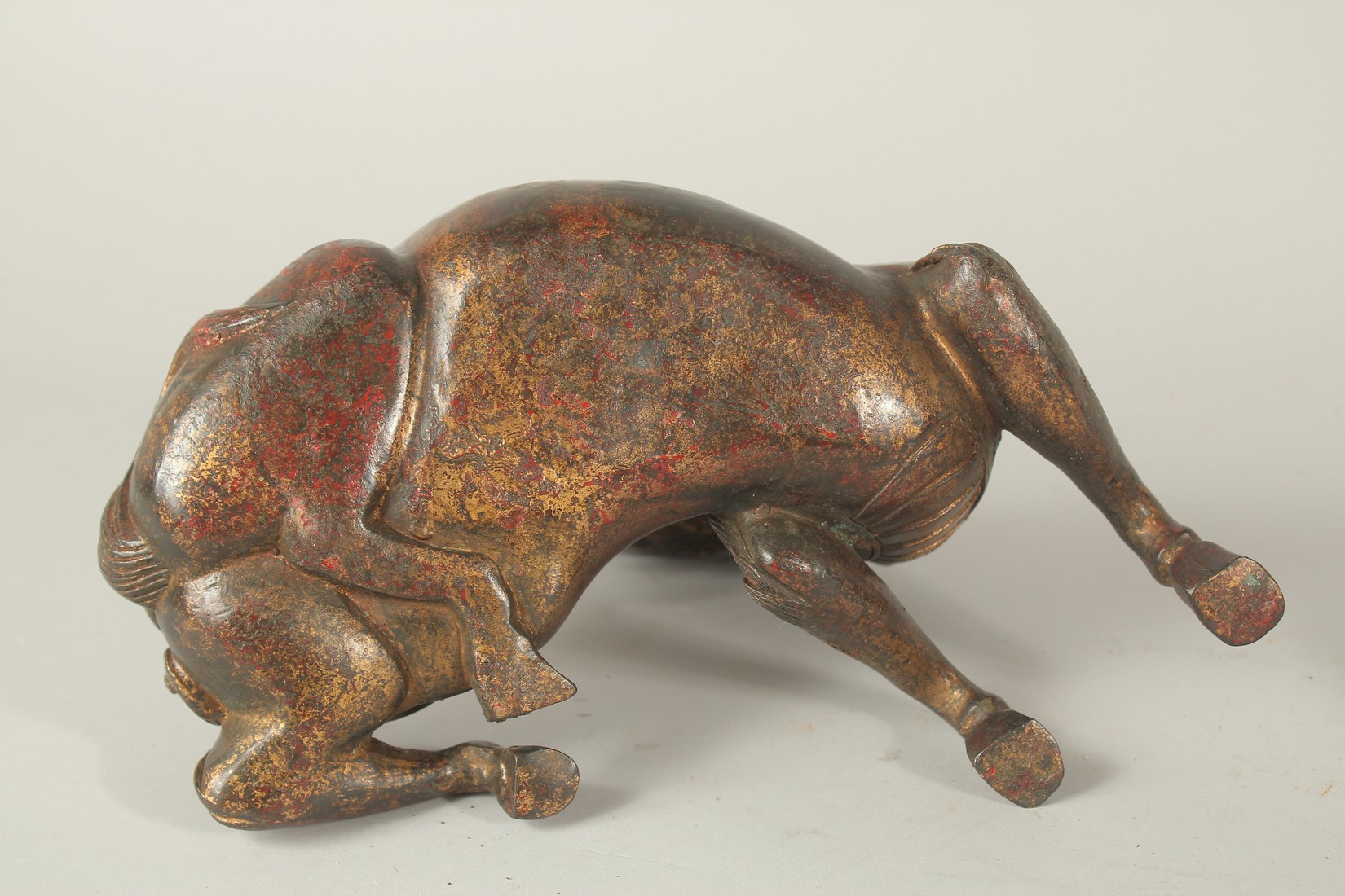 A BRONZE FIGURAL BEAST-FORM CENSER, with traces of gilt and red paint. 27cms long. - Image 4 of 4