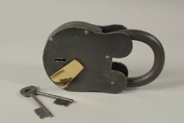 A HEAVY METAL PADLOCK AND KEY.