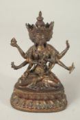 A BRONZE FIGURE OF A MULTI-ARMED DEITY. 17cms high.