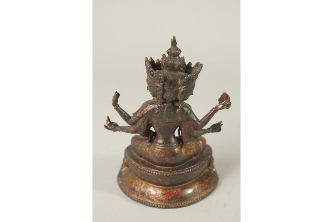 A BRONZE FIGURE OF A MULTI-ARMED DEITY. 17cms high. - Image 2 of 3