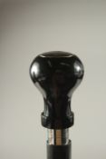 A CHROME HANDLE WALKING STICK 