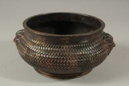 A GOOD CHINESE LATTICE WORK BRONZE CIRCULAR CENSER with lion handles. Impresssed mark. 15cms