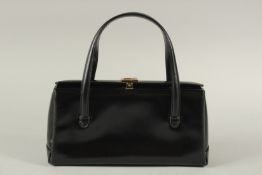 A GUCCI BLACK LEATHER BAG. 27cms long x 17cms deep.