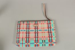 TOUS, A MIXED COLOUR CLUTCH BAG, with dust bag. 22cms long x 17cms deep.