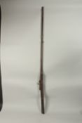 AN 18TH CENTURY MUGHAL INDIAN MATCHLOCK RIFLE, with gold inlaid barrel and trigger.