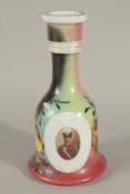 AN UNUSUAL 19TH CENTURY PERSIAN QAJAR MARKET PORCELAIN HUQQA BASE, decorated with oval portraits
