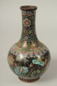 A CHINESE BLACK GROUND CLOISONNE FLORAL VASE, 25cm high.