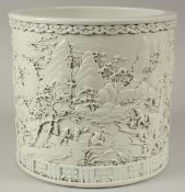 A VERY LARGE CHINESE DEHUA PORCELAIN BRUSH POT, relief-decorated with an expansive landscape: