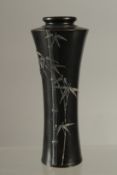 A FINE JAPANESE SILVER INLAID BRONZE VASE, with bamboo design and signed to the base, 15cm high.