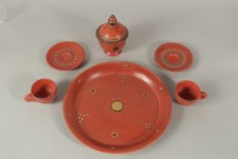 A COLLECTION OF TURKSH TOPHANE ITEMS, comprising two cups and saucers, a lidded pot, and circular