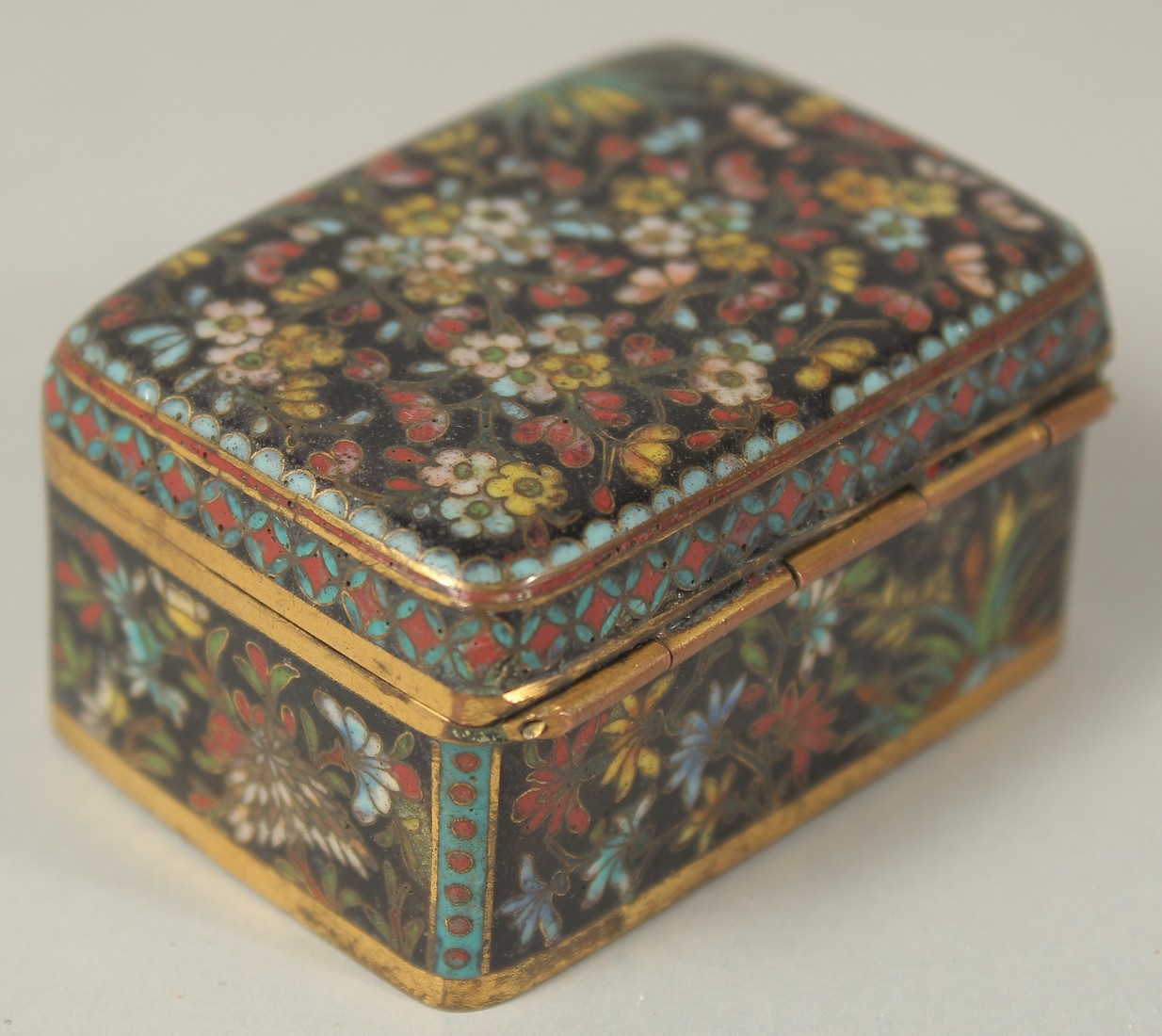A FINE JAPANESE MEIJI PERIOD BLACK GROUND CLOISONNE BOX, with floral decoration and hinged lid, 5. - Image 2 of 8