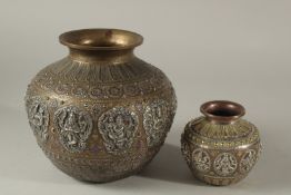 TWO 19TH CENTURY SOUTH INDIAN TANJORE GANGA JUMNA SILVER INLAID LOTA VESSELS, with embossed panels