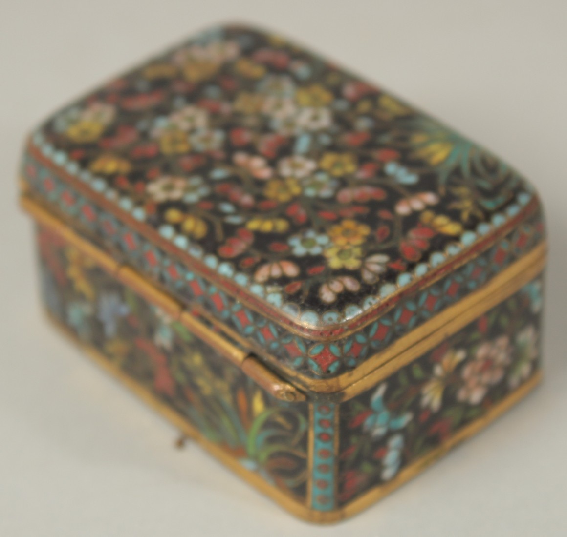 A FINE JAPANESE MEIJI PERIOD BLACK GROUND CLOISONNE BOX, with floral decoration and hinged lid, 5. - Image 4 of 8