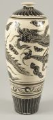 A CHINESE GLAZED POTTERY CARVED DRAGON VASE, 40cm high.