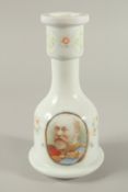AN UNUSUAL 19TH CENTURY PERSIAN OPALINE GLASS HUQQA BASE, depicting the King Edward VII, 27cm high.
