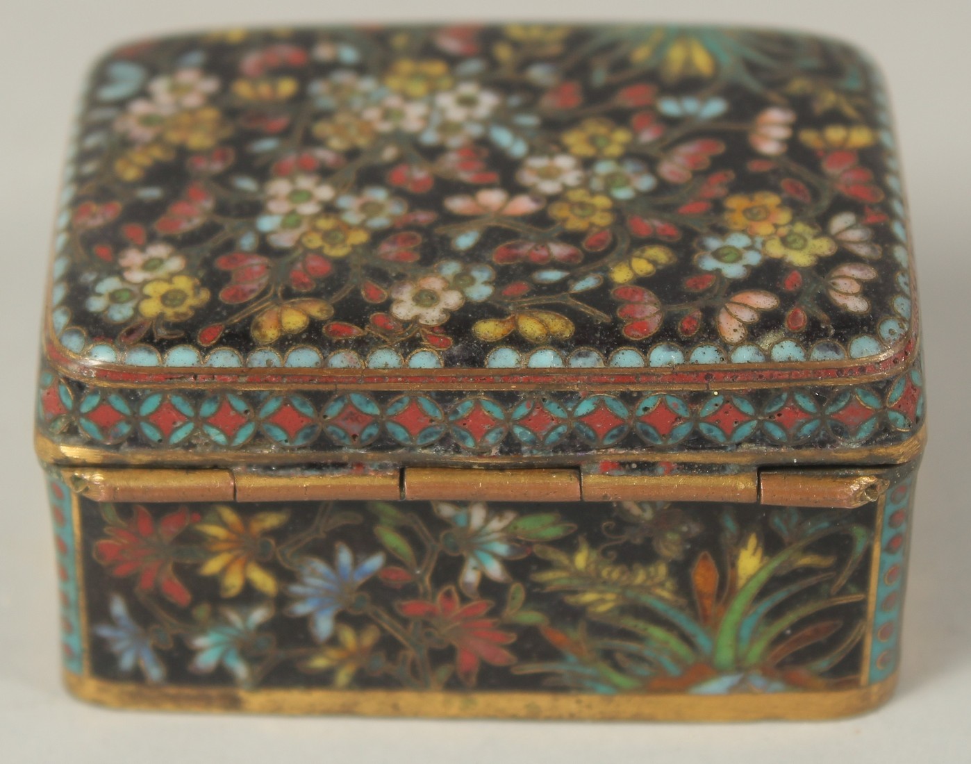 A FINE JAPANESE MEIJI PERIOD BLACK GROUND CLOISONNE BOX, with floral decoration and hinged lid, 5. - Image 3 of 8