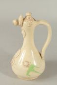 A TURKISH CANAKKALE POTTERY EWER, 21cm high.