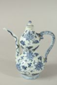 A CHINESE BLUE AND WHITE PORCELAIN LIDDED WINE POT, with dragon-formed handle, the body painted with