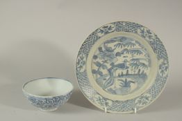 A CHINESE WANLI PERIOD BLUE AND WHITE HATCHER CARGO BOWL, together with a peacock pattern plate,
