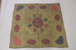 AN OTTOMAN TURKISH EMBROIDERED GILT THREAD TEXTILE WITH NAMES OF ALLAH, 118cm x 112cm.