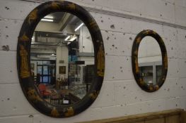 Two chinoiserie decorated oval wall mirrors.