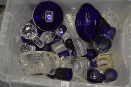 Blue sapphire glass liners and other glassware.