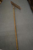 An early wooden corn reaping fork.
